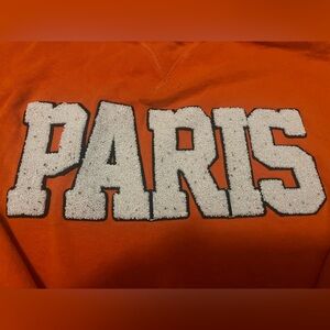Orange Paris crew neck in size medium from H&M